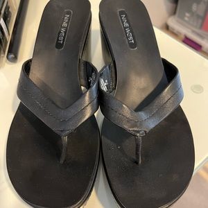 None west heeled flip flops